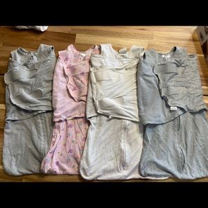 Halo sleep sacks (4) swaddles, size small. Used condition with signs of wear.